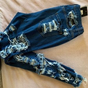 Fashion Nova, “You’re cuttin’ up” distressed jeans